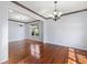 Spacious living room featuring hardwood floors, recessed lighting, and neutral walls at 12997 Bartlett Dr, Fishers, IN 46037