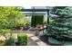 Enjoy outdoor gatherings in this patio featuring pergola, a dining table, and fire pit at 12998 Silbury Hill Way, Fishers, IN 46037