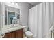 Bathroom boasts granite vanity and shower with tub at 12998 Silbury Hill Way, Fishers, IN 46037