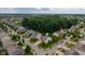 Charming home nestled in a desirable neighborhood, surrounded by mature trees and lush landscaping at 12998 Silbury Hill Way, Fishers, IN 46037