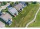 Aerial view of the homes featuring decks and green spaces with golf course views in neighborhood at 13161 Duval Dr, Fishers, IN 46037