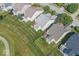 Aerial view of homes featuring decks and well-maintained lawns in a residential neighborhood at 13161 Duval Dr, Fishers, IN 46037