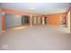 Large basement with neutral carpet, offering flexible space with multiple rooms for customization at 13161 Duval Dr, Fishers, IN 46037