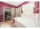 Bathroom features a large tub and a walk-in shower at 13161 Duval Dr, Fishers, IN 46037