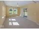 Comfortable carpeted bedroom featuring natural light and views of the outdoors from the sliding glass door at 13161 Duval Dr, Fishers, IN 46037