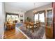 Spacious living space with hardwood floors, a fireplace, and an adjoining dining area at 13161 Duval Dr, Fishers, IN 46037