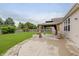 Spacious backyard with a gazebo, fire pit, and well-manicured lawn at 14332 Eddington Pl, Fishers, IN 46037