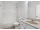 Clean bathroom featuring a shower-tub combo and a vanity sink at 14332 Eddington Pl, Fishers, IN 46037