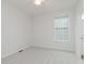 Bright bedroom featuring neutral carpet, a ceiling fan, and a window at 14332 Eddington Pl, Fishers, IN 46037