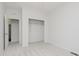 Bedroom with carpet, a walk-in closet, an ensuite bathroom, and plenty of natural light at 14332 Eddington Pl, Fishers, IN 46037
