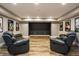 Finished basement features wood-look floors, recessed lights, and a dark accent wall at 19009 Beverly Shones Ln, Noblesville, IN 46062
