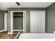 Bedroom with open closet with hanging rod and shelves at 19009 Beverly Shones Ln, Noblesville, IN 46062