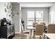 Dining room featuring a wooden table, six chairs, and decorative plates on the wall at 19009 Beverly Shones Ln, Noblesville, IN 46062