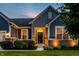 Beautiful home featuring brick accents, manicured lawn, and an inviting entryway with sidelights at 19009 Beverly Shones Ln, Noblesville, IN 46062