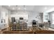 Modern kitchen and dining area features stainless steel appliances, and a breakfast bar at 19009 Beverly Shones Ln, Noblesville, IN 46062