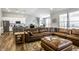 Spacious open-concept with modern flooring connecting the living room, dining, and kitchen areas at 19009 Beverly Shones Ln, Noblesville, IN 46062