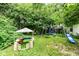 Backyard featuring play set including swings and slide, great for outdoor fun and Gathering time at 20845 Summit Rd, Noblesville, IN 46062