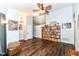 A spacious living room with wood floors and a view of the dining room and kitchen at 20845 Summit Rd, Noblesville, IN 46062