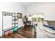 Living room features wood floors, vaulted ceilings, cozy gray couch with plenty of natural light at 20845 Summit Rd, Noblesville, IN 46062