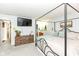 Spacious main bedroom with TV, dresser, ensuite, neutral colors, and natural light at 20845 Summit Rd, Noblesville, IN 46062
