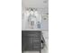Stylish bathroom featuring a modern vanity, an oval mirror, and a toilet at 2096 Whitetail Ct, Avon, IN 46123