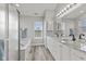 Modern bathroom with granite countertops, white cabinets, tub and separate shower with glass doors at 2096 Whitetail Ct, Avon, IN 46123