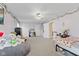Huge bedroom includes multiple windows, ceiling fan, work desk and a beanbag at 2096 Whitetail Ct, Avon, IN 46123