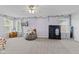 Spacious bedroom with light purple walls, ceiling fan, beanbag and ample natural light at 2096 Whitetail Ct, Avon, IN 46123