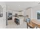 Bright kitchen featuring white cabinets, stainless steel appliances, granite countertops, and an island at 2096 Whitetail Ct, Avon, IN 46123
