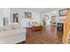 Cozy living room showcases hardwood floors, a comfortable sofa, and an antique grandfather clock at 2096 Whitetail Ct, Avon, IN 46123