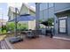 Back deck featuring an outdoor seating area with grill perfect for entertaining with a view of the modern home at 2140 Alabama St, Indianapolis, IN 46202