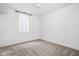 Bright basement bedroom featuring neutral carpet, white walls and ceiling, and a window at 2140 Alabama St, Indianapolis, IN 46202