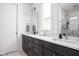 Bathroom features a double vanity, modern fixtures, and a glass-enclosed shower at 2140 Alabama St, Indianapolis, IN 46202