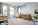 Bedroom featuring a crib, chair, and large windows providing plenty of natural light at 2140 Alabama St, Indianapolis, IN 46202
