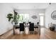 Elegant dining room features large windows, ample natural light, and stylish accents at 2140 Alabama St, Indianapolis, IN 46202