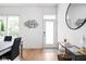 Bright entryway featuring hardwood floors and modern art, creating an inviting space at 2140 Alabama St, Indianapolis, IN 46202
