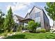 Contemporary home boasting lush green lawn and meticulously maintained landscaping at 2140 Alabama St, Indianapolis, IN 46202
