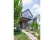 Striking front exterior with covered porch, modern design, and well-kept landscaping at 2140 Alabama St, Indianapolis, IN 46202
