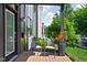 Inviting front porch offers seating and outdoor charm for relaxing in style at 2140 Alabama St, Indianapolis, IN 46202