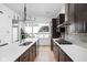 Modern kitchen featuring stainless steel appliances, counter seating, and bright natural light at 2140 Alabama St, Indianapolis, IN 46202