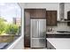 Modern kitchen with stainless steel appliances, a large window, and ample natural light at 2140 Alabama St, Indianapolis, IN 46202