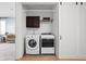 Laundry closet with modern washer and dryer units at 2140 Alabama St, Indianapolis, IN 46202