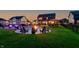 Backyard with a pool, fire pit, gazebo, and outdoor seating under twilight at 2245 Meadow Crk, Avon, IN 46123