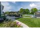 Beautiful backyard featuring a gazebo, outdoor dining area, pool, and lush landscaping, perfect for outdoor entertaining at 2245 Meadow Crk, Avon, IN 46123