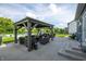 Spacious outdoor area with multiple gazebos, comfortable seating, and lush landscaping, perfect for relaxing and entertaining at 2245 Meadow Crk, Avon, IN 46123