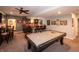 Spacious basement with a pool table and stylish bar area, perfect for entertaining at 2245 Meadow Crk, Avon, IN 46123