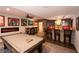 Spacious basement with a pool table, bar area, and sports memorabilia at 2245 Meadow Crk, Avon, IN 46123