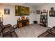 Inviting basement with a comfortable sofa, TV, and sports-themed decorations at 2245 Meadow Crk, Avon, IN 46123
