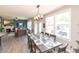 Elegant dining area with ample natural light and an open view to the living room at 2245 Meadow Crk, Avon, IN 46123