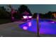 Swimming pool featuring illuminated fountains and poolside palm trees at twilight at 2245 Meadow Crk, Avon, IN 46123